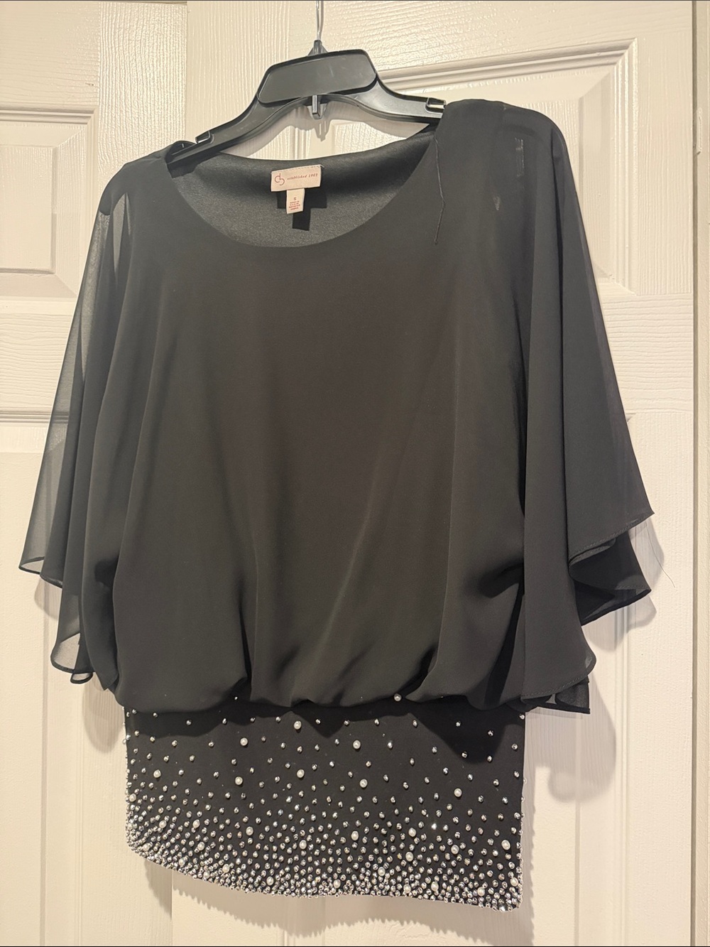 Chiffon Overlay Black Blouson Top with Embellished Hem